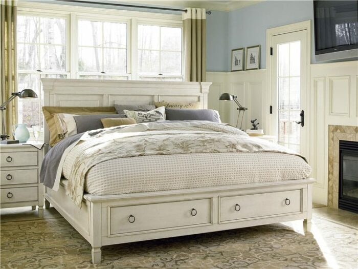 lite colored bedfram with 2 drawers closed